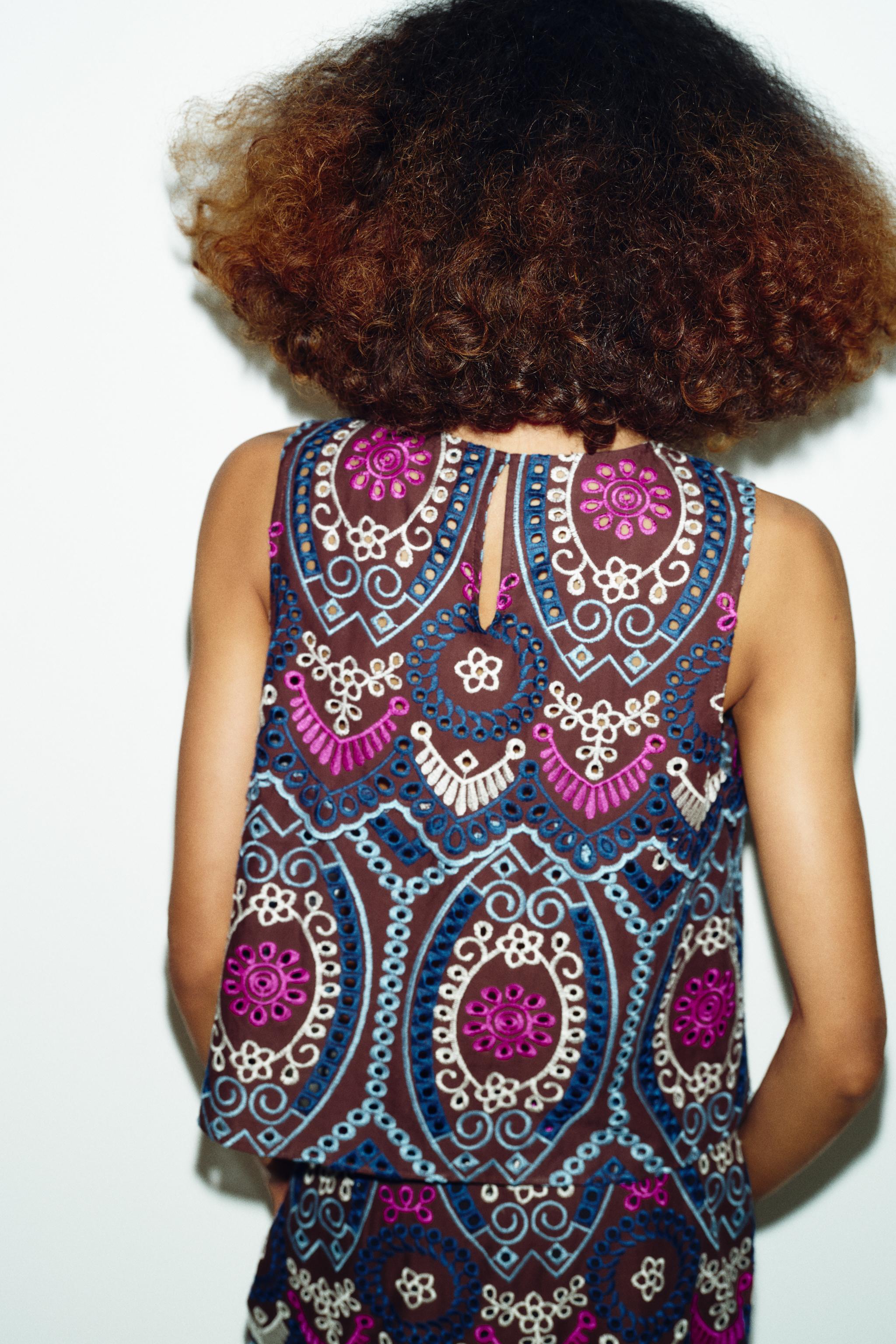 EMBROIDERED EYELET TOP